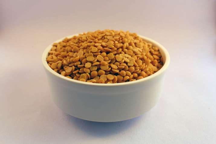 Arhar pulses cost cross Rs 100 per Kilogram due to low production and pulses export Arhar pulses cost cross Rs 100 per Kilogram due to low production and pulses export- India TV Paisa