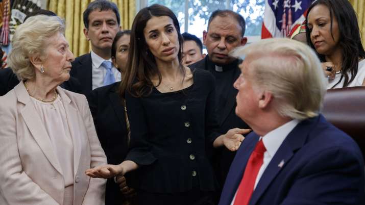 President Donald Trump listens to Nobel Peace Prize winner Nadia Murad, a Yazidi from Iraq | AP President Donald Trump listens to Nobel Peace Prize winner Nadia Murad, a Yazidi from Iraq | AP- India TV