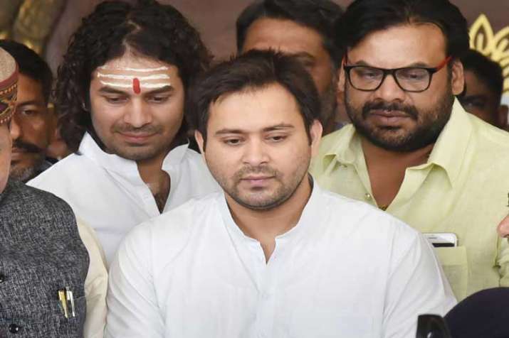 Rashtriya Janata Dal (RJD) leader Tejashwi Yadav with... Rashtriya Janata Dal (RJD) leader Tejashwi Yadav with...- India TV