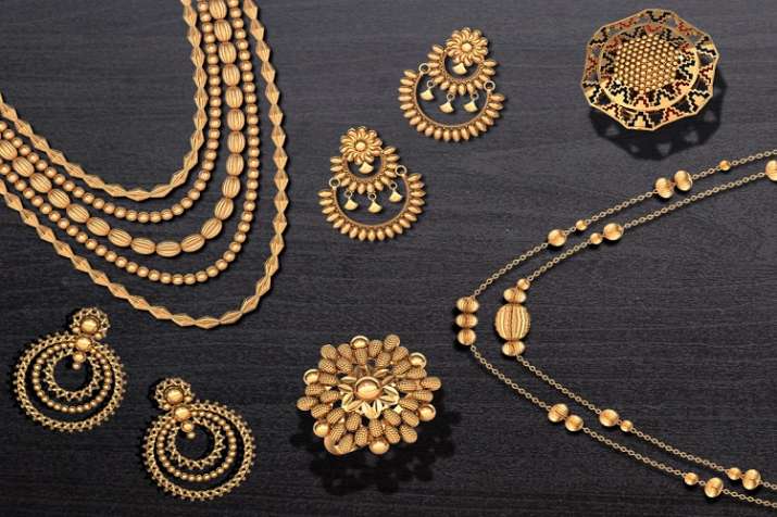 Gold futures up on global cues, spot demand Gold futures up on global cues, spot demand- India TV Paisa