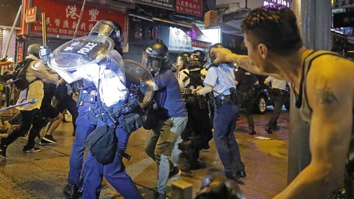 Hong Kong police arrest 36, youngest aged 12, after violent protests | AP Hong Kong police arrest 36, youngest aged 12, after violent protests | AP- India TV