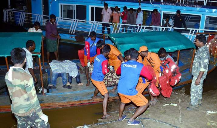 APSDRF personnel rescue passengers of a boat which... APSDRF personnel rescue passengers of a boat which...- India TV