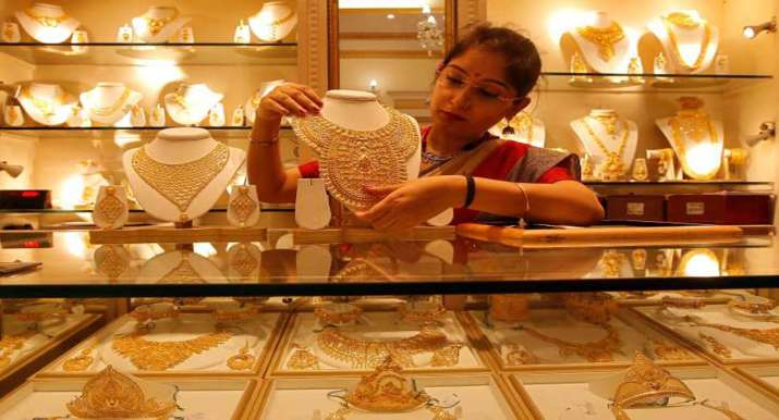 Gold rises Rs 126 on weaker rupee, festive demand Gold rises Rs 126 on weaker rupee, festive demand- India TV Paisa