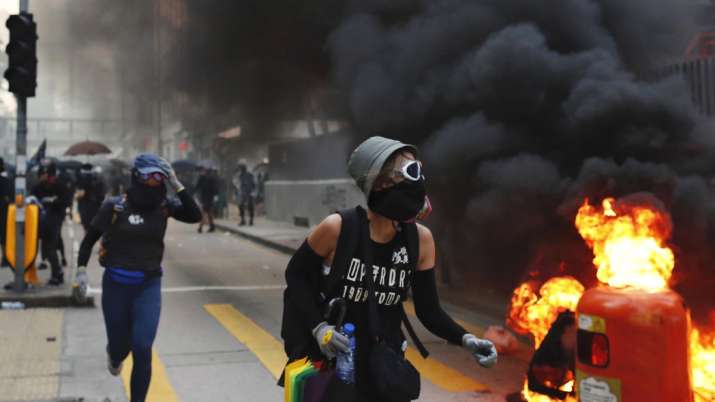 Hong Kong police slammed in fresh protests over shooting of teenage boy | AP Hong Kong police slammed in fresh protests over shooting of teenage boy | AP- India TV