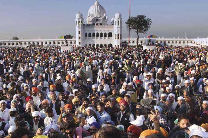 Sikh pilgrims visit the shrine of their spiritual leader... Sikh pilgrims visit the shrine of their spiritual leader...- India TV