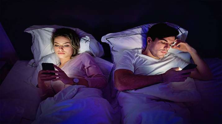 Smartphones in bed can ruin your sex life Smartphones in bed can ruin your sex life- India TV Paisa